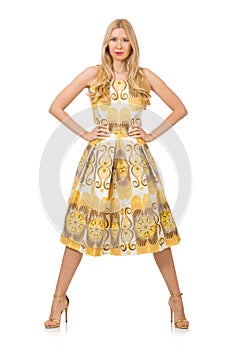 The pretty girl in yellow floral dress isolated on