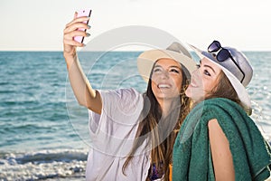 Pretty Girls at the Beach Taking Selfie