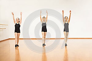 Pretty girls ready to do flips in dance class