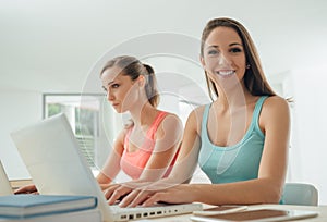 Pretty girls studying together