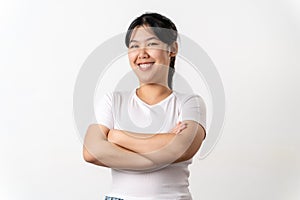 the pretty and happy Asian young woman is smiling confidently standing on a white background