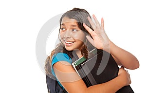 Pretty Hispanic Girl Waving with Books and Backpac