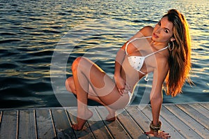 Pretty hispanic swimsuit model posing