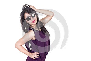 Pretty Hispanic woman wearing sunglasses