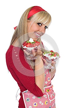 Pretty housewife holding fruits