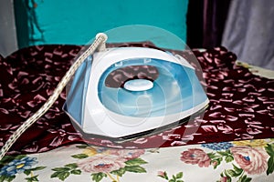 Pretty ironer to put on a clothes ironing table for ironing a beautiful shirt