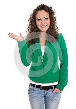 Pretty isolated business woman in green presenting with hand.