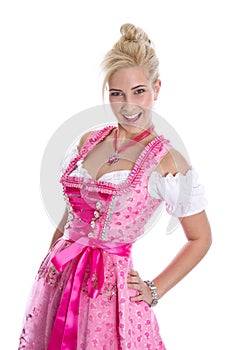 Pretty isolated young woman wearing bavarian dress called dirndl