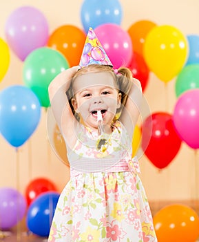 Pretty joyful kid girl on birthday party