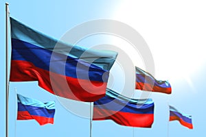 Pretty labor day flag 3d illustration - 5 flags of Luhansk Peoples Republic are waving against blue sky picture with soft focus