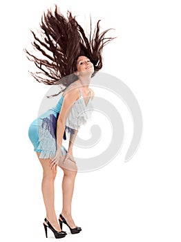 Pretty lady with long hairs flying upwards