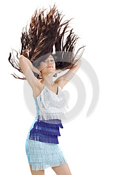 Pretty lady with long hairs flying upwards