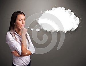 Pretty lady thinking about cloud speech or thought bubble with c