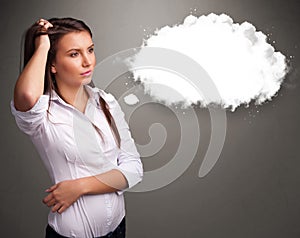 Pretty lady thinking about cloud speech or thought bubble with c