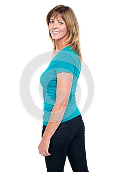 Pretty lady turning back and looking at you