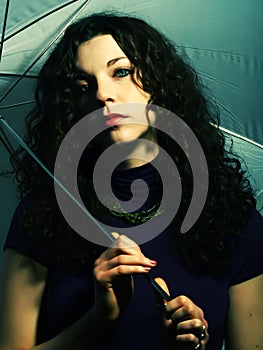 Pretty lady with an umbrella