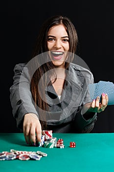 Pretty lady wiining blackjack game at casino