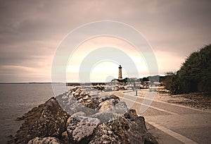 pretty landscape of Saint-Georges-de-Didonne and its famous lighthouse at sunset photo