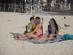 Pretty Latinas at Progreso Beach at Sunset