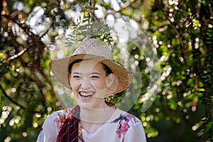 Pretty Laughing Girl Behind A Spider Cobweb In The Trees
