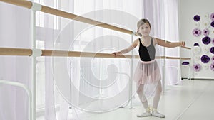 Pretty Little Ballerina In Pointe Practicing Dance At Classical Ballet School