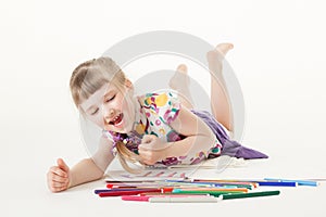 Pretty little girl choosing a felt-tip pen