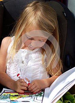 Pretty little girl colouring