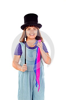Pretty little girl doing magic with a top hat and a magic wand