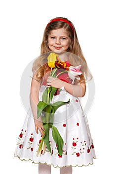 Pretty little girl with flowers