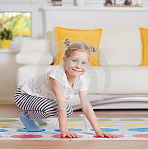 Pretty little girl have fun playing exciting game