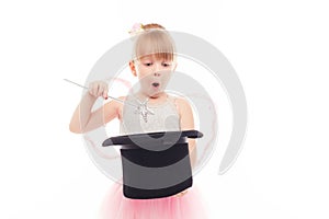 Pretty little girl holding hat