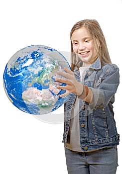 Pretty little girl holding the Planet Earth