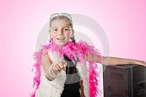 A pretty little girl with a pink feather boa