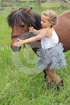 Pretty Little Girl with Pony