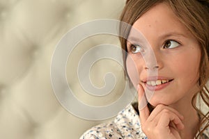 Pretty little girl poses beautifully at home