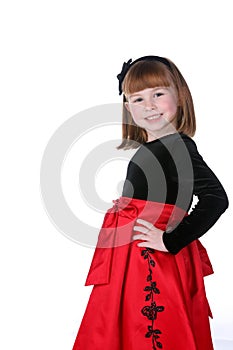 Pretty little girl in red and black holiday dress
