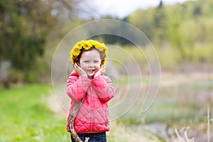 Pretty little girl relax at beauty summer landscape background