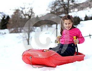 Pretty little girl with ski suit with the bob photo
