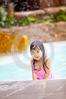 Pretty Little Girl on the swimming pool