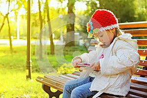 Pretty little girl with a Tablet PC