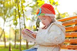 Pretty little girl with a Tablet PC