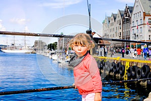 Pretty little girl visiting the city of bergen in norway