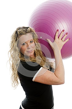 Pretty middle age woman exercising with dumbells