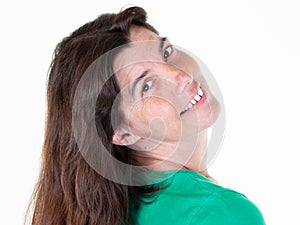 Pretty middle aged woman smile positively at camera poses photographer against white background