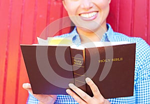 Pretty Mixed Race Woman Reading Holy Bible