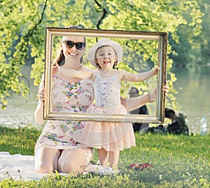 Pretty mother posing with her beloced child