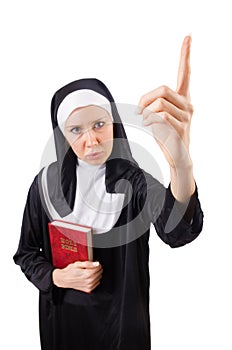 Pretty nun with Bible isolated on the white