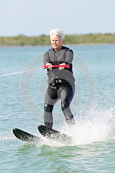 Pretty Older Lady Water Skiing