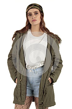 Pretty parka coat wearing grunge, rock punk girl in a long oversized white t-shirt with a blank space ready for your design