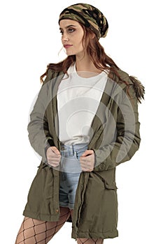 Pretty parka coat wearing grunge, rock punk girl in a long oversized white t-shirt with a blank space ready for your design